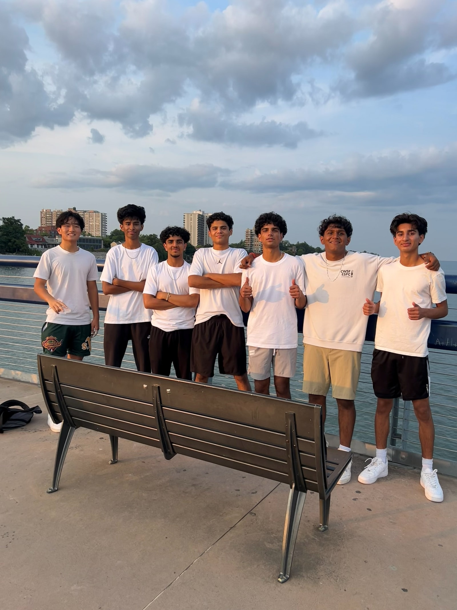 A photo of Vedant and his friends on the Burlington waterfront at sunset